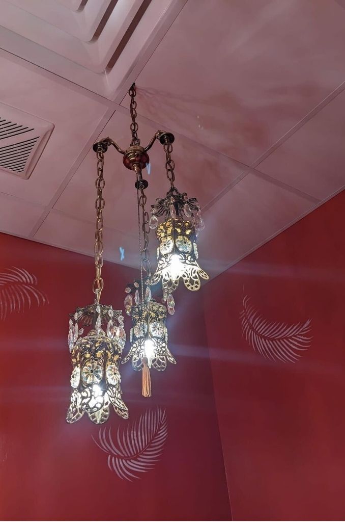 vintage chandelier inside JBiRD Wine Bar